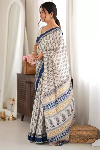 blue color tissue fabric smart printed saree with beautiful border work