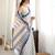 blue color tissue fabric smart printed saree with beautiful border work