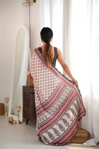 maroon color tissue fabric smart printed saree with beautiful border work