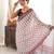 maroon color tissue fabric smart printed saree with beautiful border work