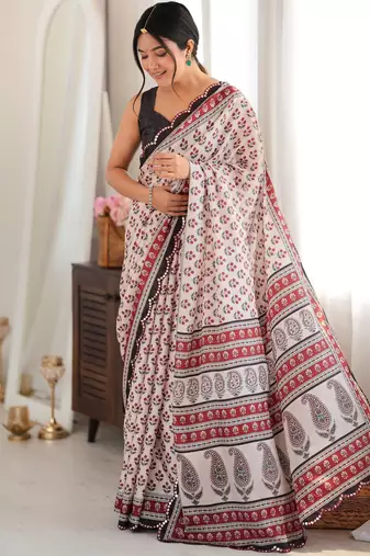 maroon color tissue fabric smart printed saree with beautiful border work