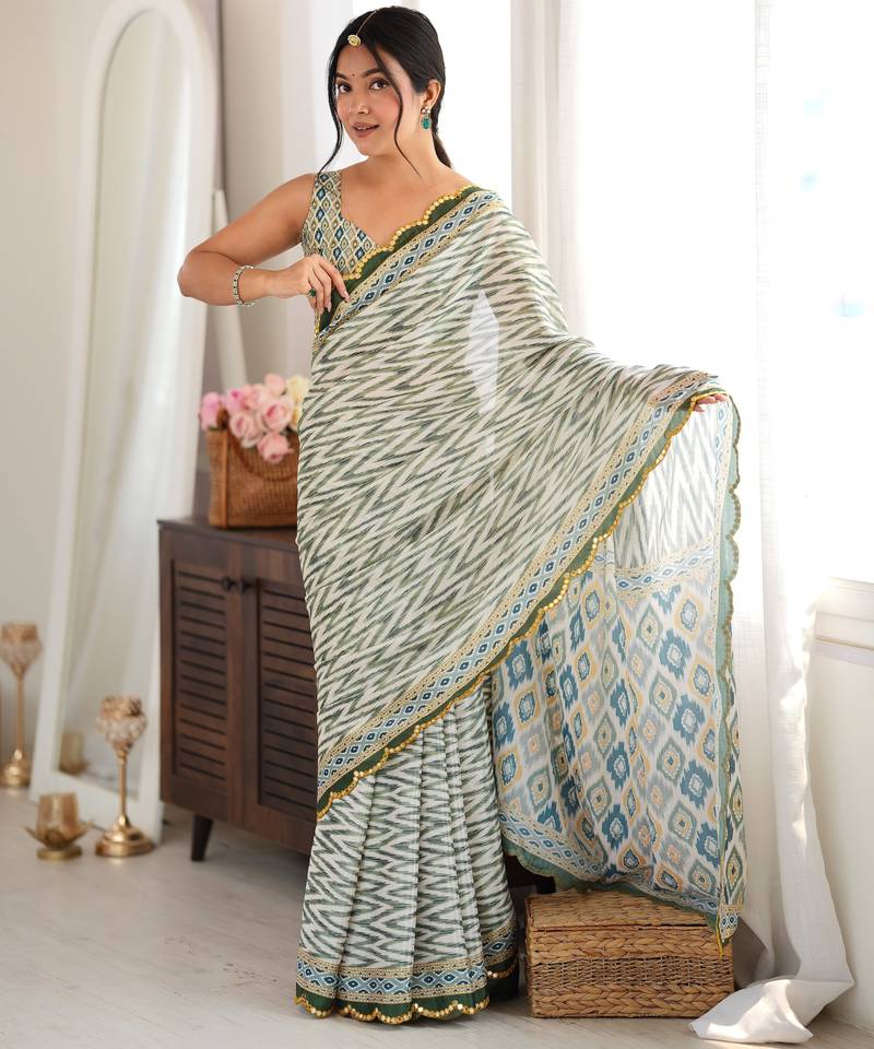Green color chinon fabric smart printed saree with beautiful border work