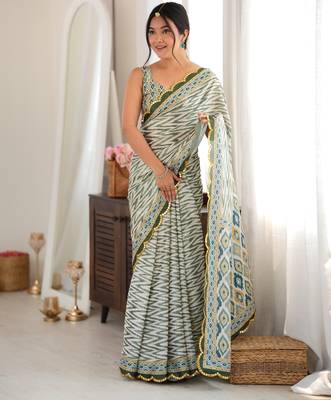 Green color chinon fabric smart printed saree with beautiful border work 2