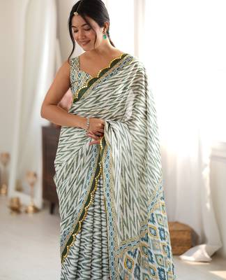 Green color chinon fabric smart printed saree with beautiful border work 3