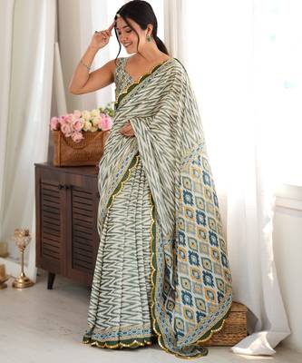 Green color chinon fabric smart printed saree with beautiful border work 4