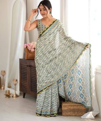 Green color chinon fabric smart printed saree with beautiful border work 5