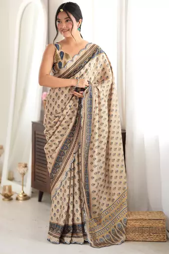 beige color tissue fabric smart printed saree with beautiful border work