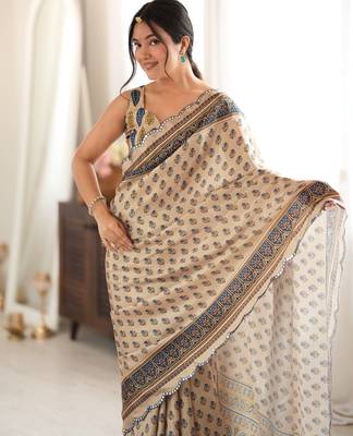 Beige color chinon fabric smart printed saree with beautiful border work 3