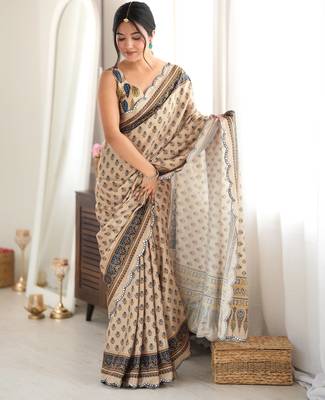 Beige color chinon fabric smart printed saree with beautiful border work 4