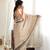Beige color chinon fabric smart printed saree with beautiful border work