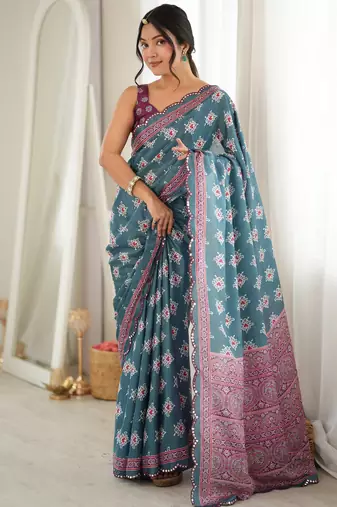 green color tissue fabric smart printed saree with beautiful border work