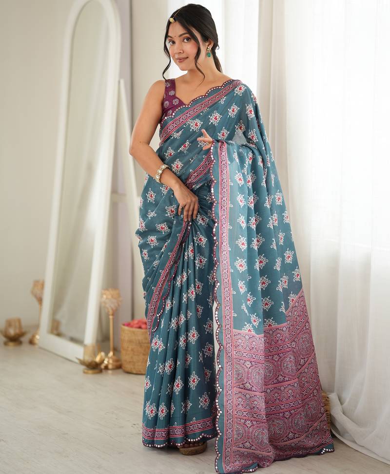 green color tissue fabric smart printed saree with beautiful border work