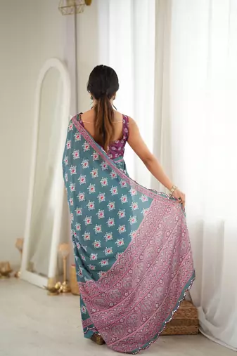 green color tissue fabric smart printed saree with beautiful border work
