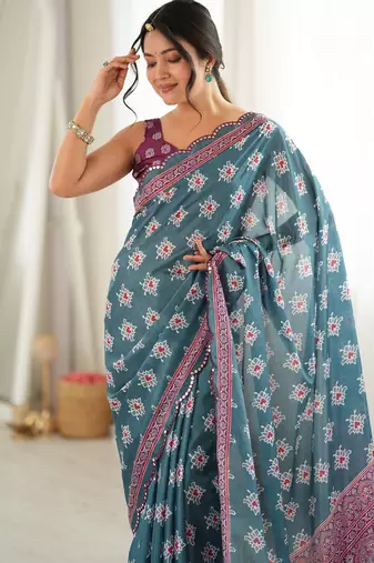 green color tissue fabric smart printed saree with beautiful border work