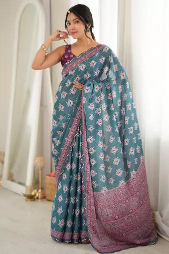 green color tissue fabric smart printed saree with beautiful border work