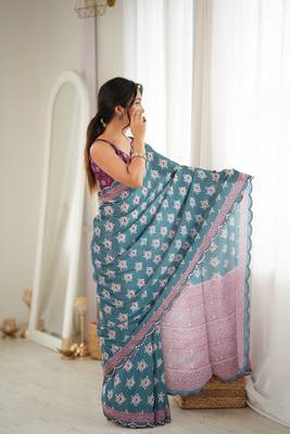 green color tissue fabric smart printed saree with beautiful border work 5