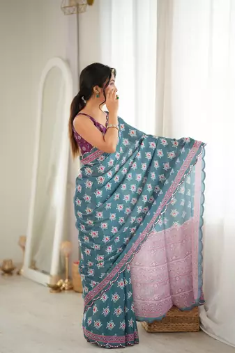 green color tissue fabric smart printed saree with beautiful border work