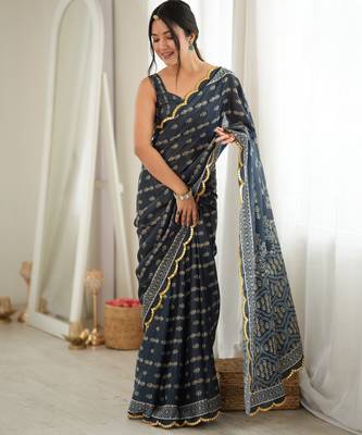 Grey color chinon fabric smart printed graceful looks saree 1