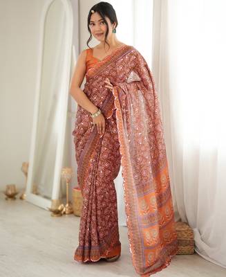 Orange color chinon fabric smart printed graceful looks saree 1