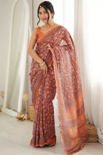Orange color chinon fabric smart printed graceful looks saree