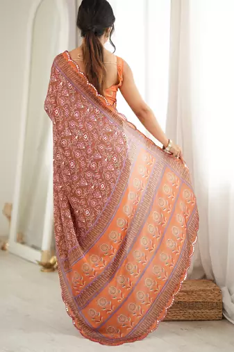 Orange color chinon fabric smart printed graceful looks saree