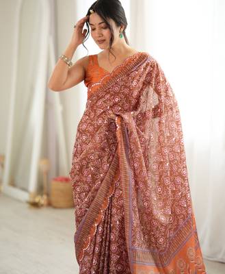 Orange color chinon fabric smart printed graceful looks saree 3