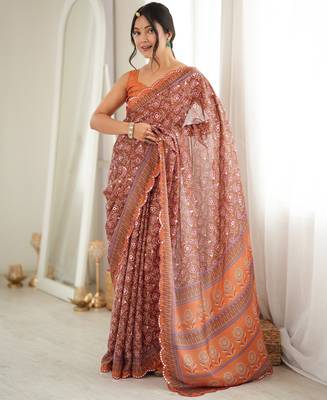 Orange color chinon fabric smart printed graceful looks saree 4
