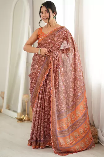 Orange color chinon fabric smart printed graceful looks saree
