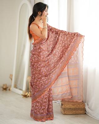 Orange color chinon fabric smart printed graceful looks saree 5