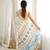Off white color chinon fabric smart printed graceful looks saree