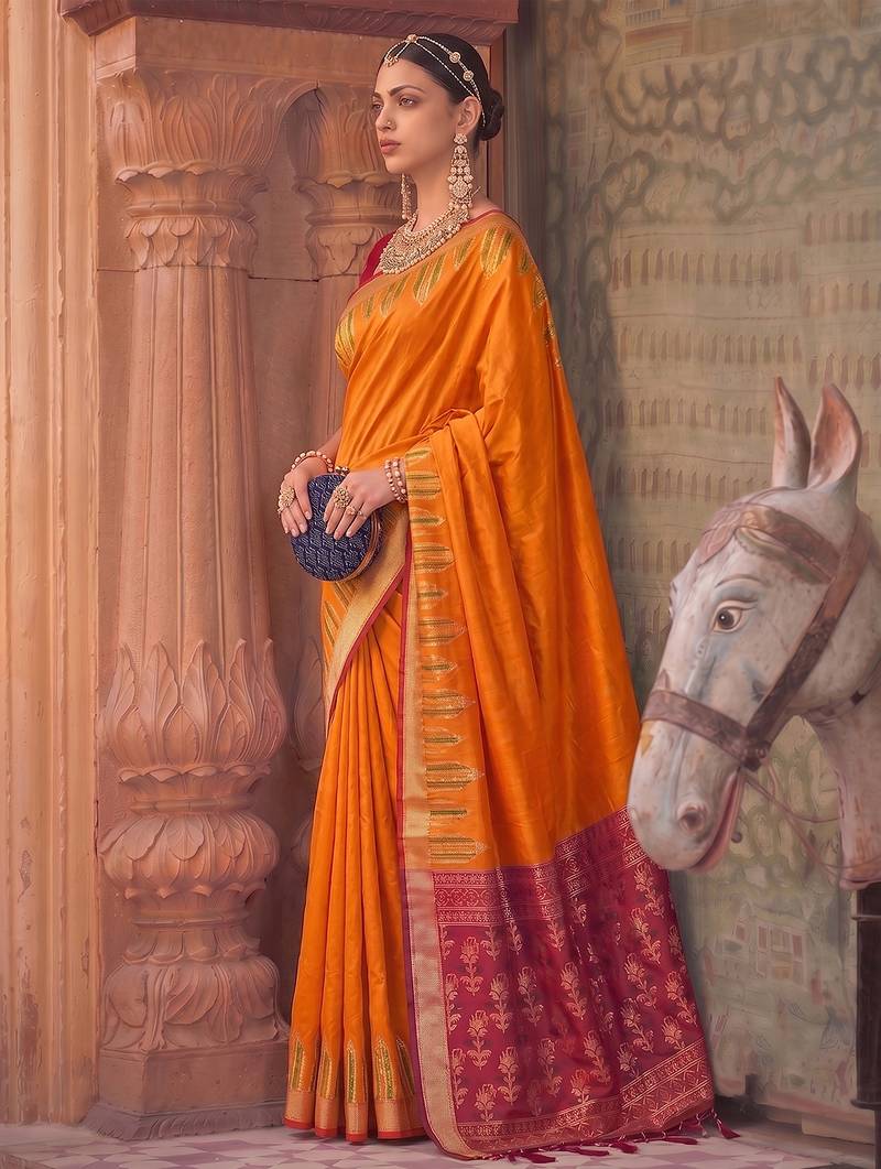 orange color soft silk blend woven designer ethnic partywear saree