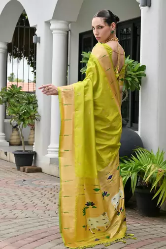 Green color smart paithani woven designer banarasi silk saree for traditional rich looks