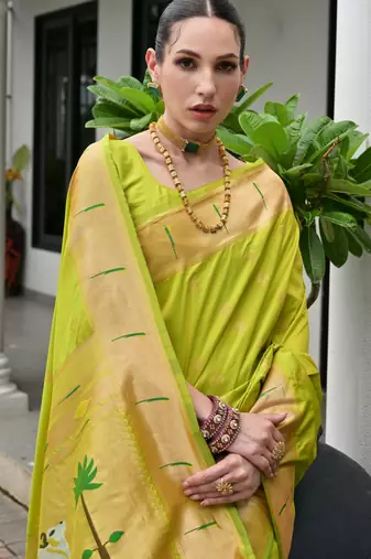 Green color smart paithani woven designer banarasi silk saree for traditional rich looks
