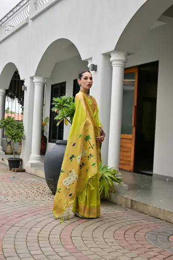 Green color smart paithani woven designer banarasi silk saree for traditional rich looks