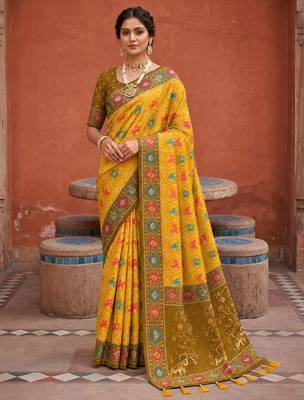 Yellow color patola silk woven meenakari jacquard designer saree for rich traditional saree 1