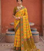 Yellow color patola silk woven meenakari jacquard designer saree for rich traditional saree