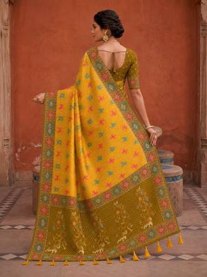 Yellow color patola silk woven meenakari jacquard designer saree for rich traditional saree 2