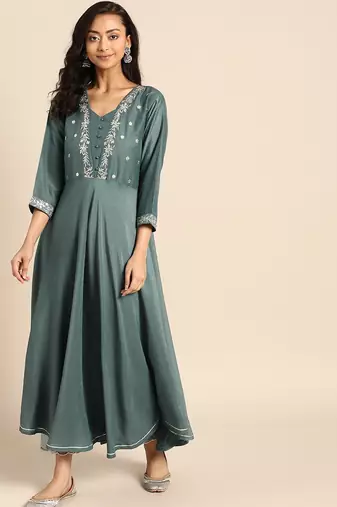 Women Teal Green Embroidered Kurta with Trousers