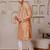 Orange color graceful ethnic kurta payjama for men's festive looks
