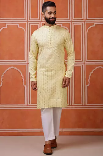 Yellow color graceful ethnic kurta payjama for men's festive looks