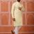 Yellow color graceful ethnic kurta payjama for men's festive looks