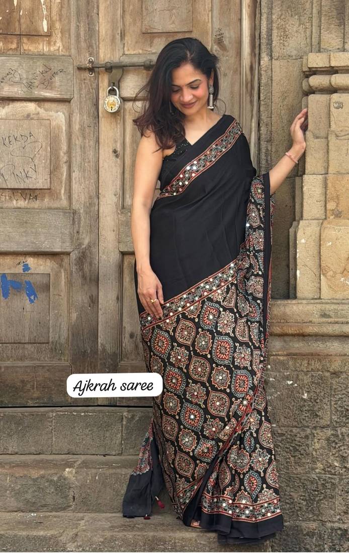 black crepe embroidered saree with mirror work