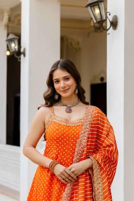 orange color embroidered and mirror work silk blend salwar suit  2