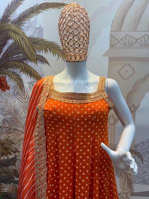 orange color embroidered and mirror work silk blend salwar suit  3