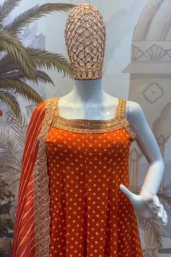 orange color embroidered and mirror work silk blend salwar suit 