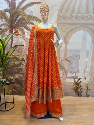 orange color embroidered and mirror work silk blend salwar suit  4