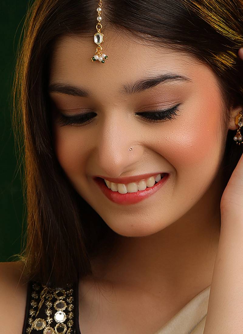 Emerald green stone kundan maang tikka