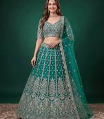 Delightful Rama-Green Dori, Zari, and Sequins Embroidered Rangoli Silk Indian party wear lehenga