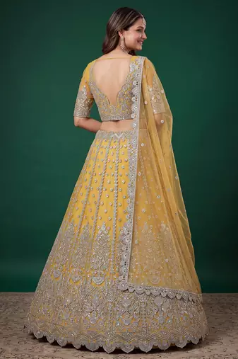 Fetching Yellow Dori, Zari, and Sequins Embroidered Rangoli Silk wedding sangeet ceremony lehenga