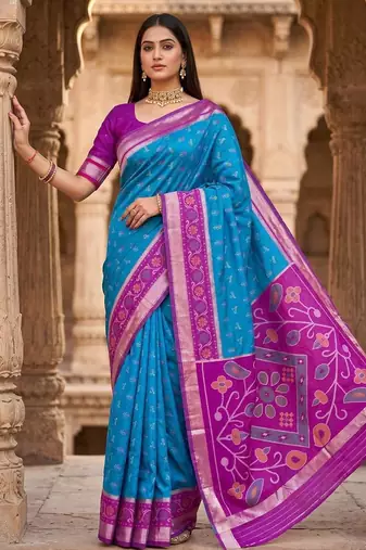 Sky blue color pochampally silk blend ikkat design zari border sarees